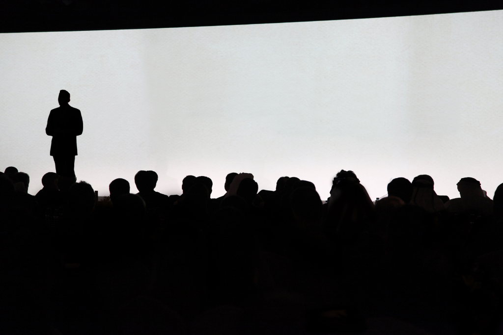 Keynote speaker delivering a customized presentation tailored to the event's theme and audience