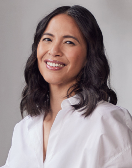 Motivational keynote speaker addressing business leaders